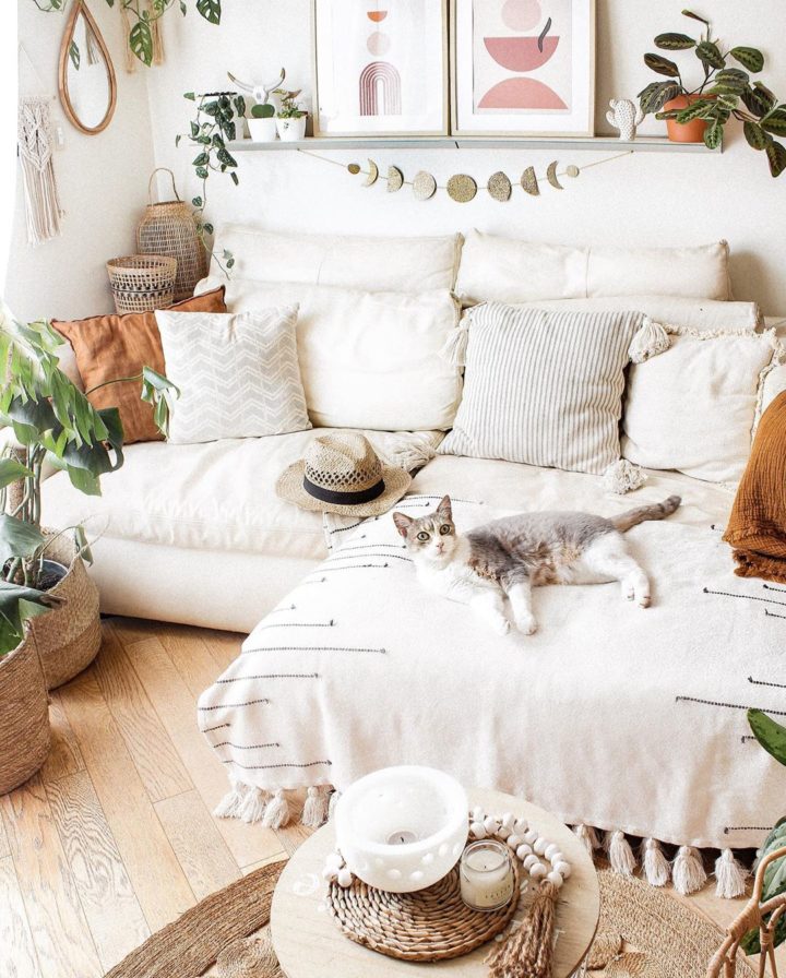 cozy boho living room with white sectional sofa