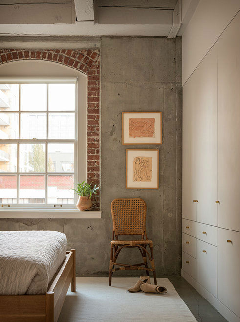 bedroom with concrete and brick wall pearl loft