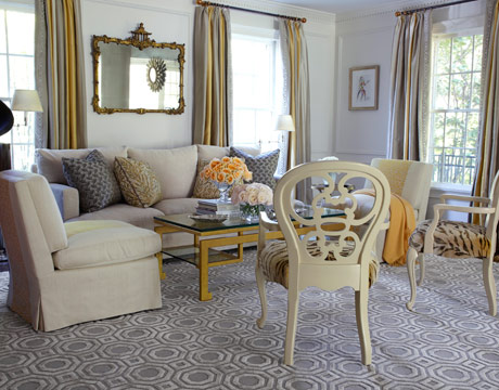 beige armchairs and gray flooring