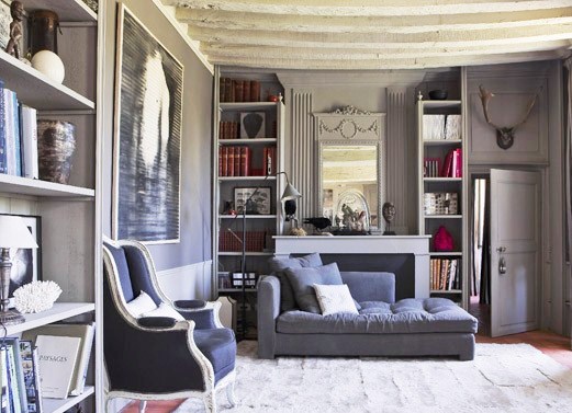 gray living room design with library 